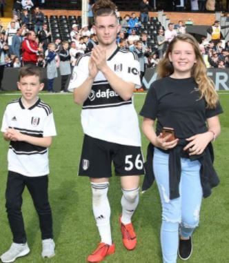 Harvey Elliott with his younger brother and sister.